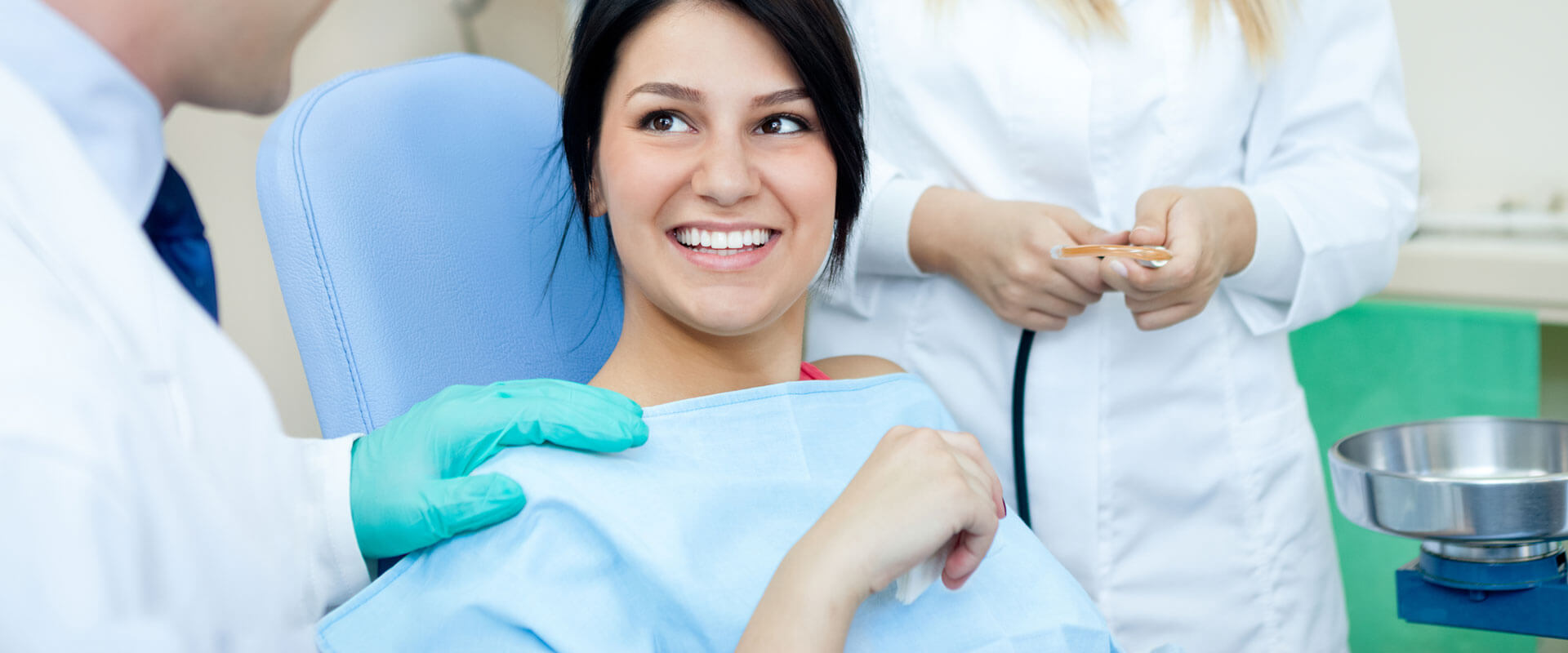 Patient smiling at dental practice